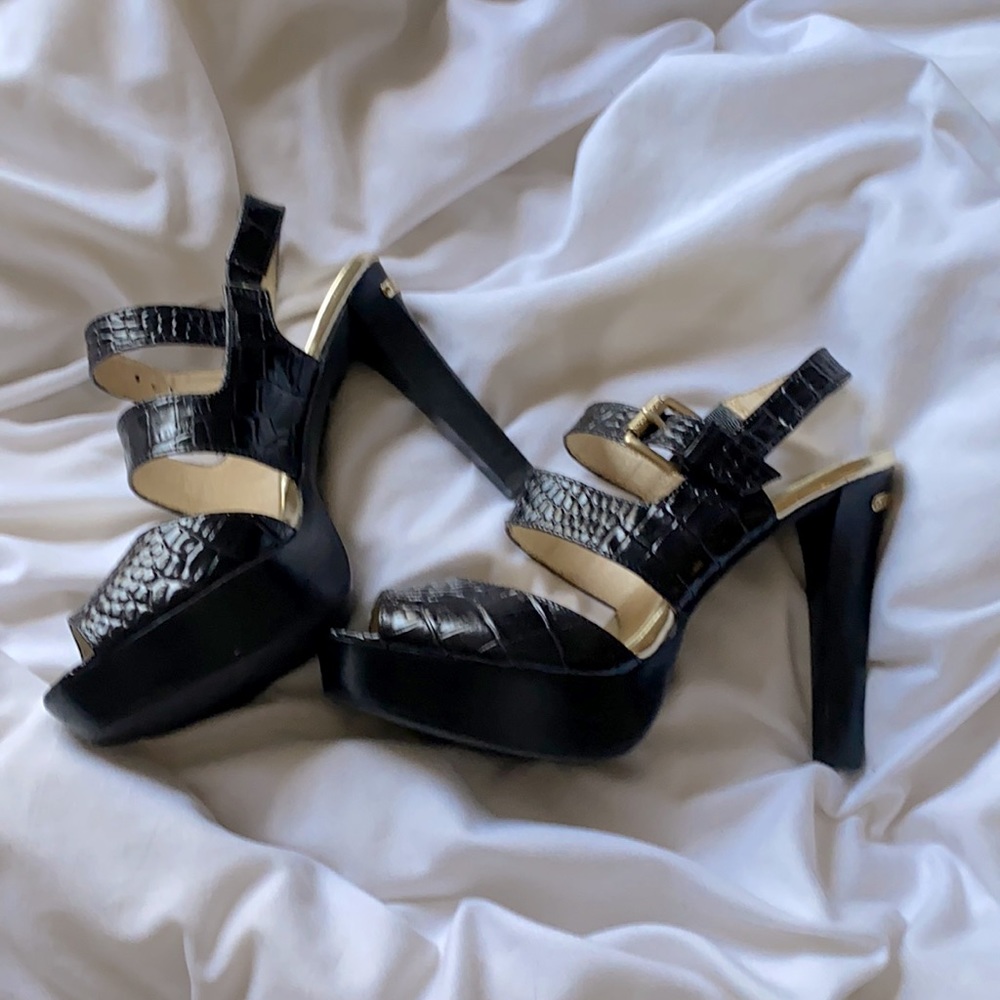 Michael Kors Black Snakeskin with gold accents. 8.5M Worn once